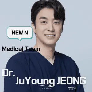 Dr. JuYoung Jeong from New N Dental Medical Team wearing blue scrubs, smiling at the camera.